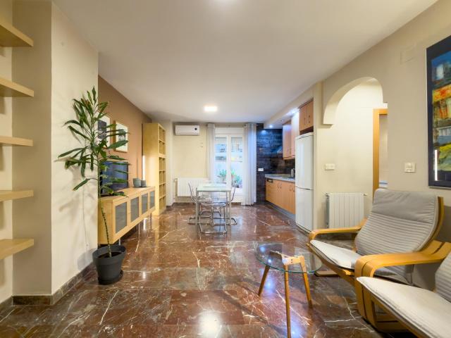 Loft Urbano con Patio XXL: Tu Refugio en el Centro