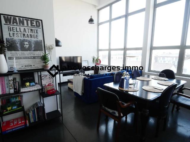 Loft 64 m² avec parking et balcon