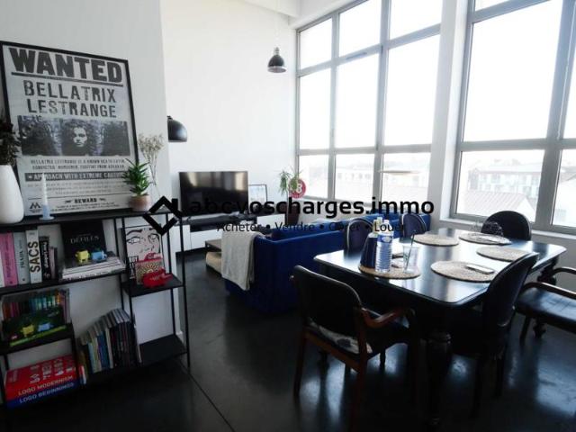 Loft 64 m² avec parking et balcon