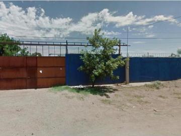 Terreno bardeado con oficina y renta activa en Colonia Aeropuerto, Chihuahua