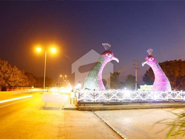 Low cost 10 marla residential plot with all dues paid is available for sale in ghaznavi block sector f bahria town lahore