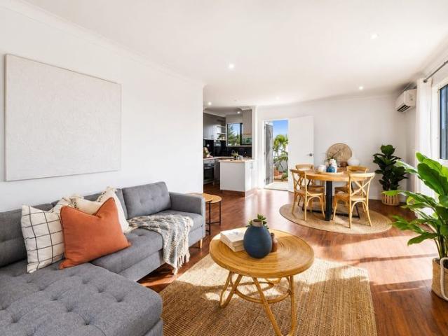 Low Maintenance Top Floor Apartment in Premier Beachside Address Unfurnished
