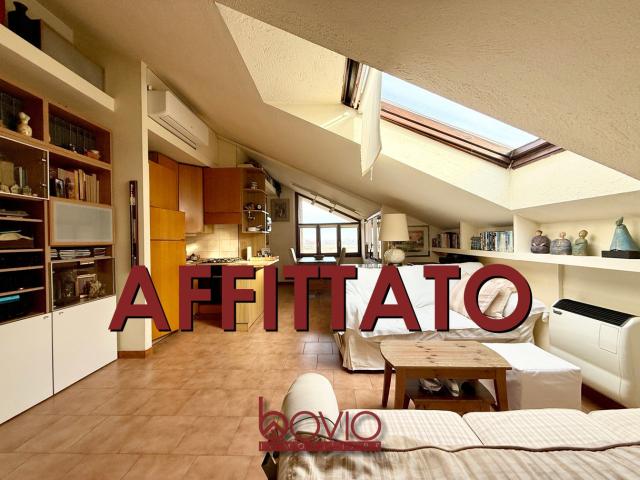 LUMINOSA MANSARDA IN AFFITTO