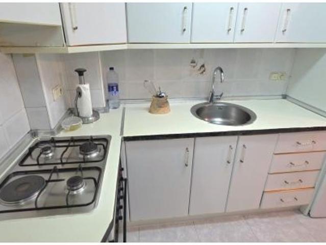 Luminoso apartamento de 2 dormitorios con vistas despejadas y piscina comunitaria