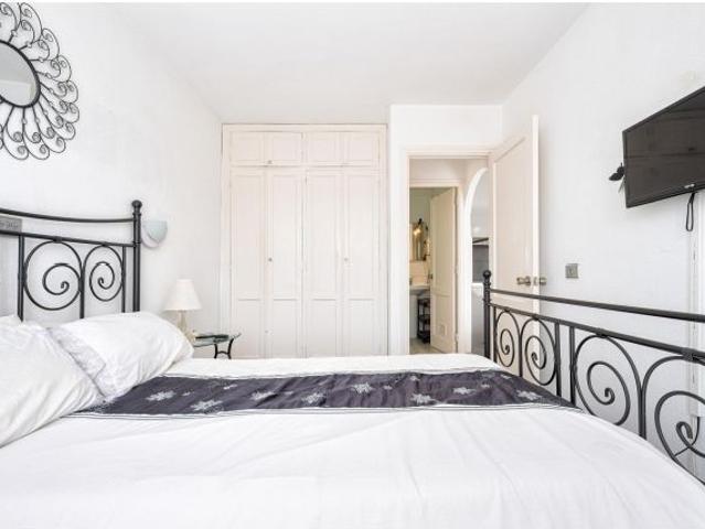 Luminoso apartamento de esquina con un dormitorio y una amplia terraza con impresionantes vistas al
