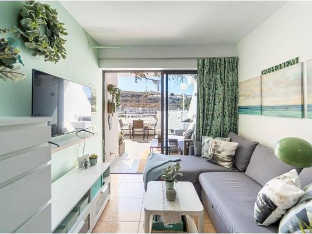 ¡Luminoso apartamento de esquina con gran terraza privada en el céntrico complejo Arimar, Puerto Ric