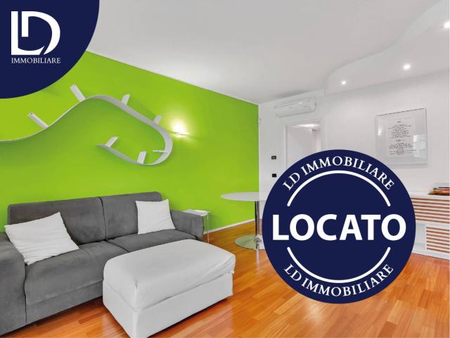 Luminoso bilocale ristrutturato e arredato con box e cantina