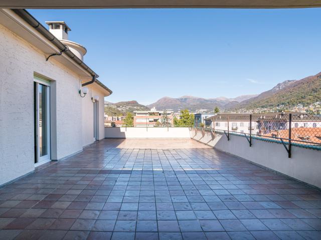 LUGANO – ATTICO CON TERRAZZO TRA STORIA E ARTE