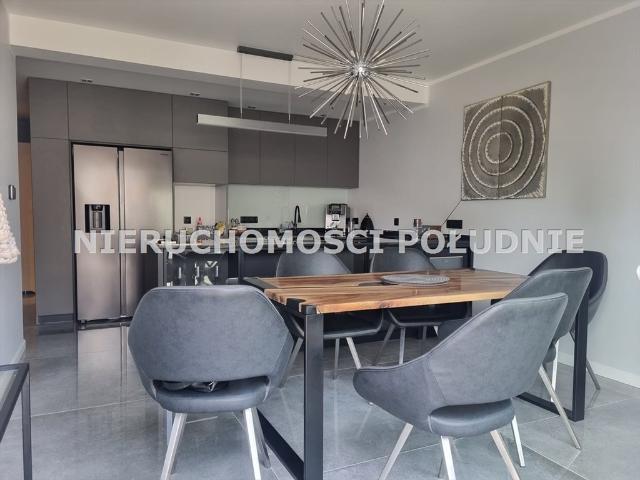 Luksusowy apartament z tarasem i dwoma miejscami parkingowymi