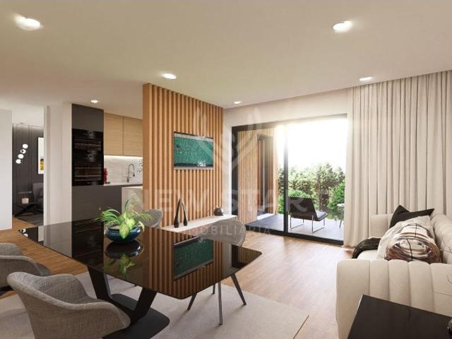 Luxuoso Apartamento T2 com terraço privativo, piscina comum e estacionamento, em Olhão