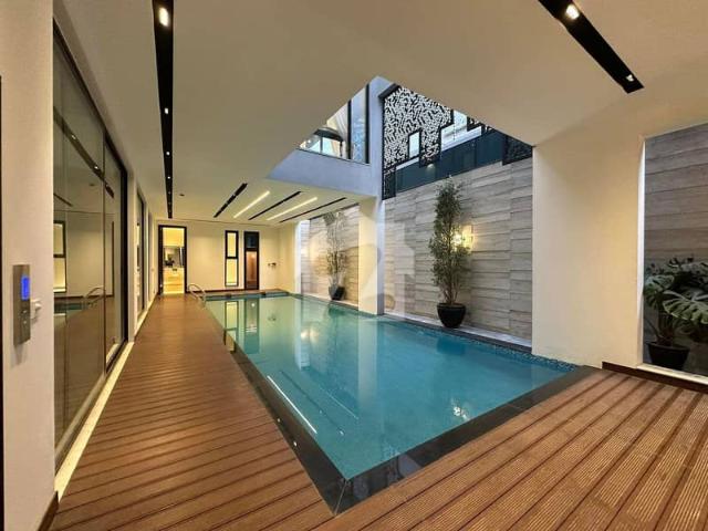 Luxurious 1 Kanal Dream Home With Private Pool In DHA 2 Prime Location Near McDonalds!