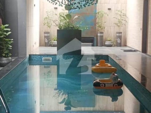 Luxury 1 Kanal Semi Furnished House with Full Basement, Swimming Pool & 16kW Solar | DHA Phase 7 S Block