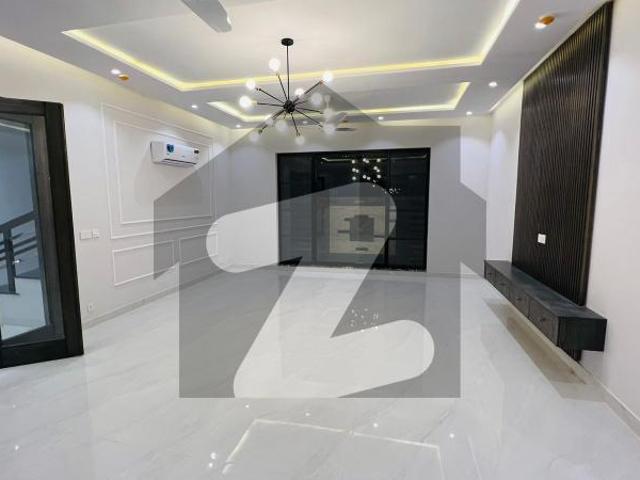 Luxury, Comfort & Convenience All in One Brand New 1 Kanal Modern Bungalow in DHA Phase 6 with Premium Finishing, 5 En Suite Bedrooms, Drawing, Dining, TV Lounge, Lawn & Easy Deal with Wall Green Realtors DHA Phase 6
