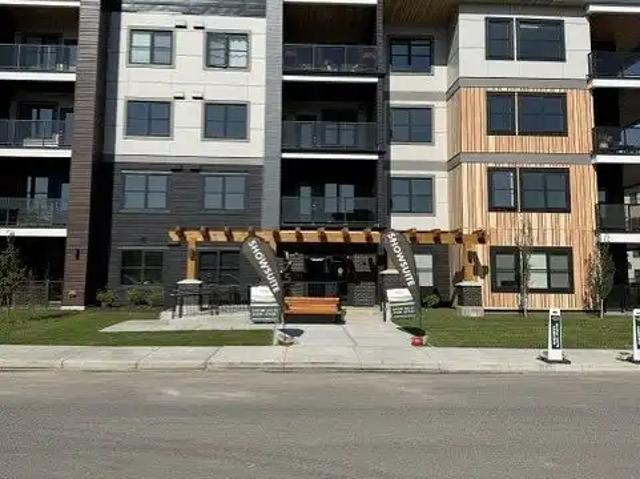 Luxury Apartment 2BR/2BA — Heated Floors, In‑Suite Laundry & Wolf Willow Nature