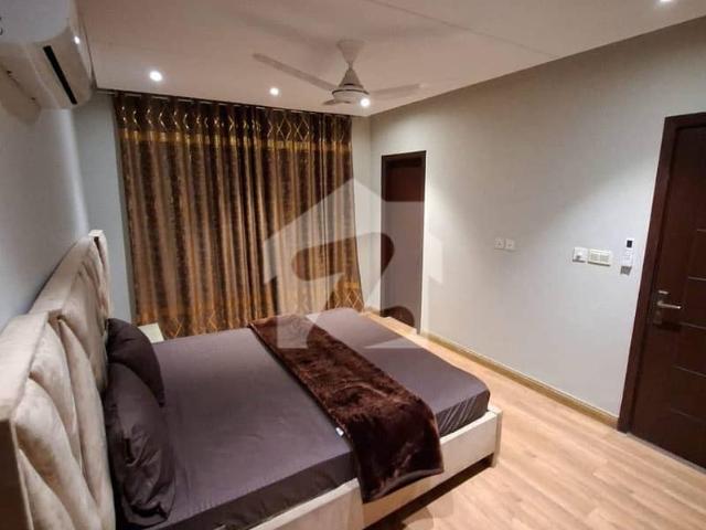 Luxury building luxury 2bed room apartment for sale drowning dining tv lounge in main Gulberg Lahore