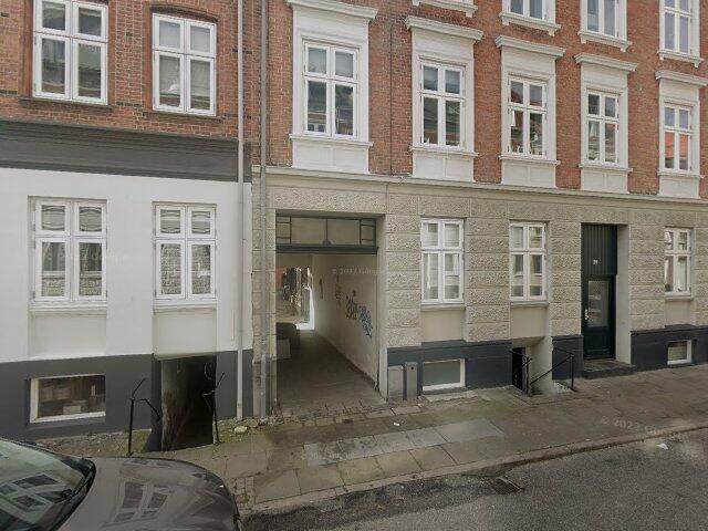 Lys og indbydende lejlighed i Aalborgs hjerte