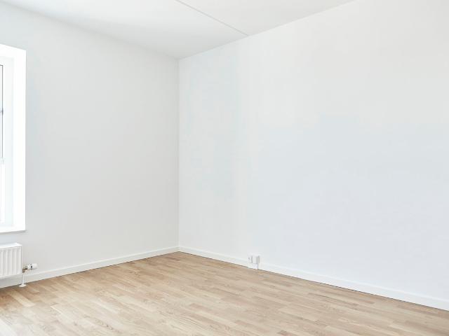 Lys penthouse på 128 m² med tre soveværelser