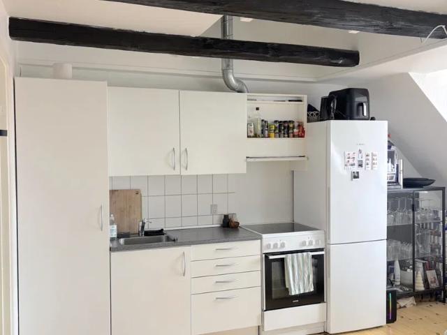Lys taglejlighed på 39 m² med hems i Aalborg