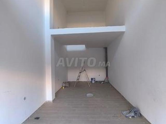 Magasin neuf avec mezzanine à vendre