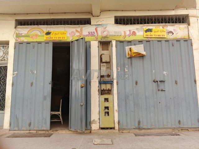 Magasin avec cave à vendre