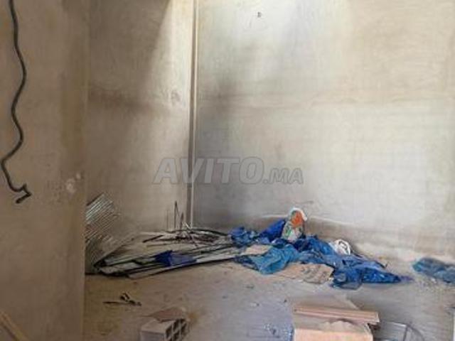Magasin commercial à vendre avec 2 rideaux