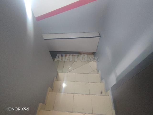 Magasin et cave 2 façades avec un bail commercial