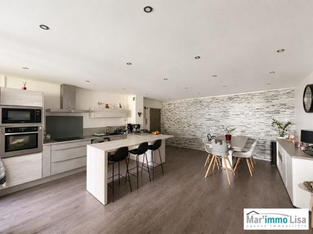 MAGNIFIQUE APPARTEMENT AVEC STATIONNEMENT ET CAVE