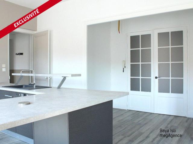 Magnifique appartement traversant de 135m² avec un garage, grenier et cave