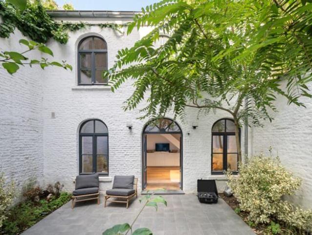 Magnifique arrière maison avec charmant jardin de 35m²