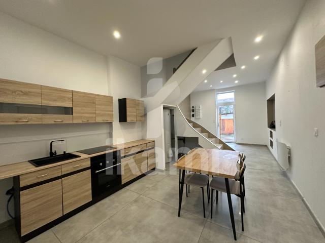 Magnifique duplex lumineux avec terrasse, jardin et garage environnement calme