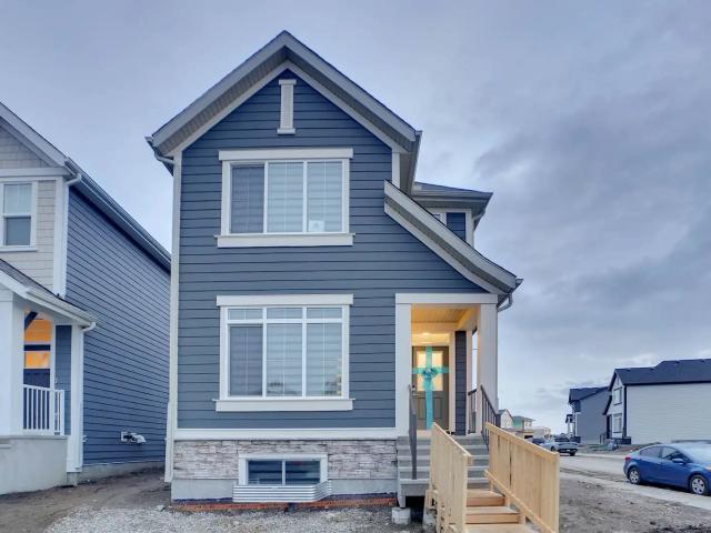 MAHOGANY 4Br/3Bath MAIN Suite with Double Detached Garage