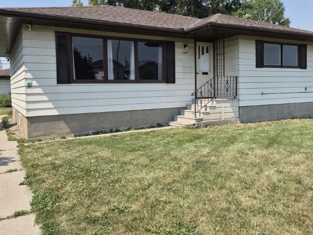 MAIN FLOOR WITH HUGE WEST REAR YARD