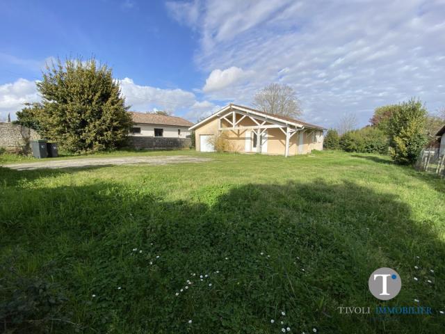 Maison 3 chambres, 110 m2 habitable. Garage, sur jardin clos de