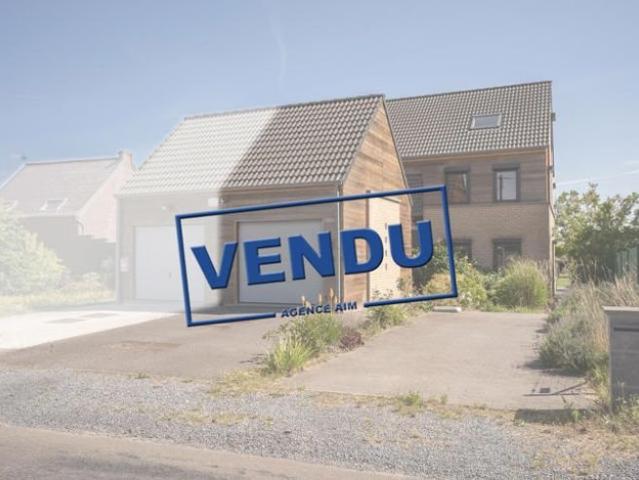 Maison 3 façades avec garage