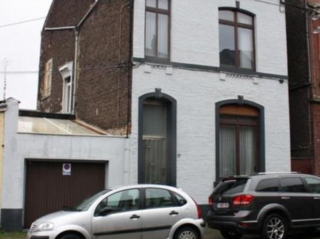 Maison 3 façades avec jardin et garage