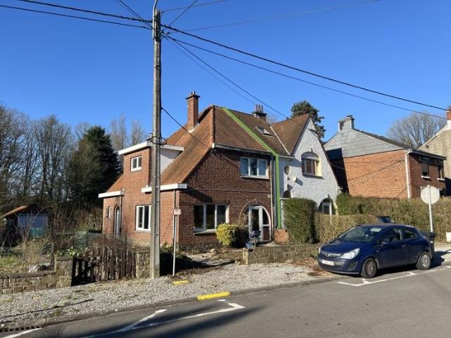Maison 3 façades avec jardin et garage