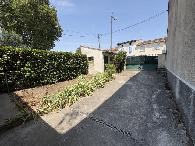 MAISON 3 PIECES EN CENTRE VILLE CASTELNAUDARY AVEC VERANDA ET JARDINET