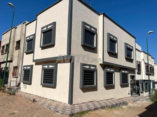 Maison 100 m2 deux faces lotissement alliance