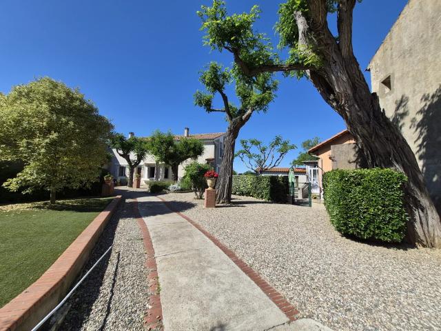 Maison 10 pièces 242 m²