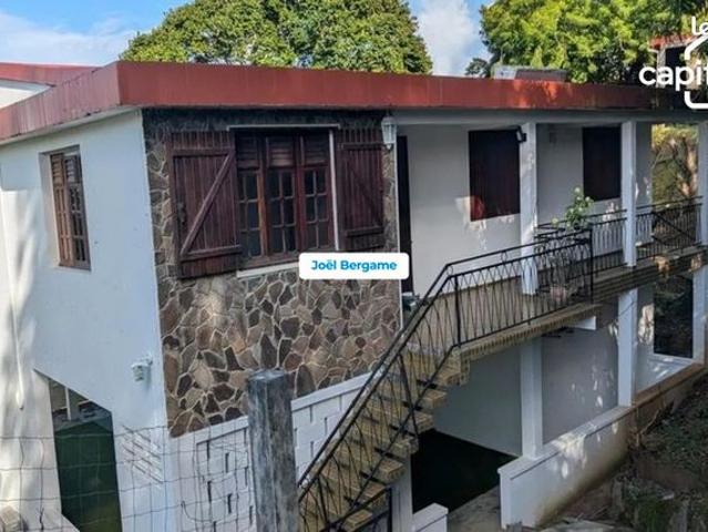 Maison 10 pièces 398 m²