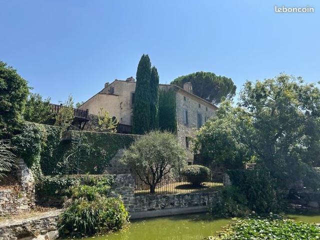 Maison 10 pièces 303 m²