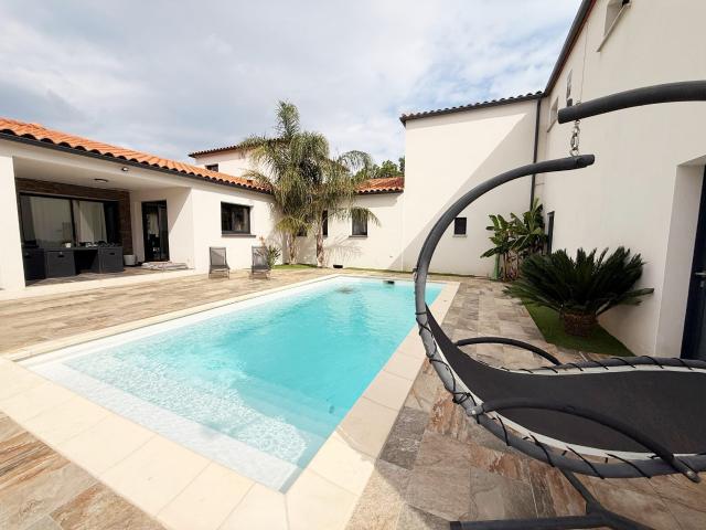 Maison 10 pièces 466 m²