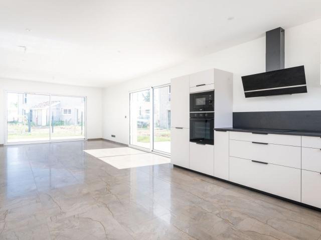 Maison 120m2 avec 4 chambres et garage