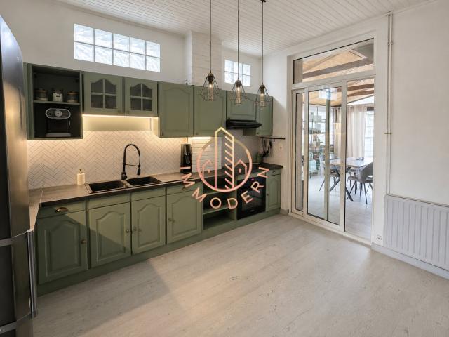 Maison 2 chambres, jardin, garage, allée de stationnement de 97m2