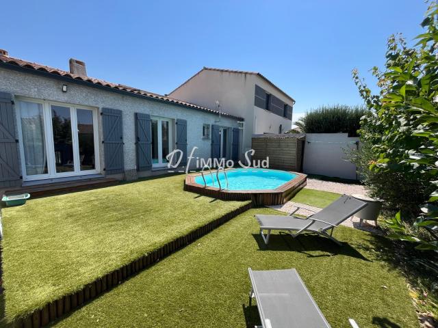 MAISON 2 FACES AVEC PISCINE ET JARDINS AU SOMAIL