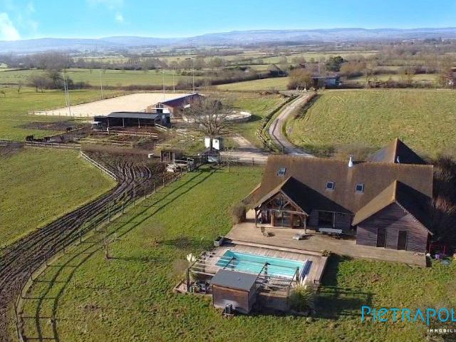 Maison 7 pièces 239 m²