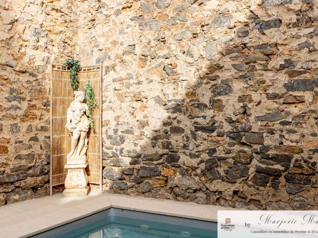 Maison 7 pièces 239 m²