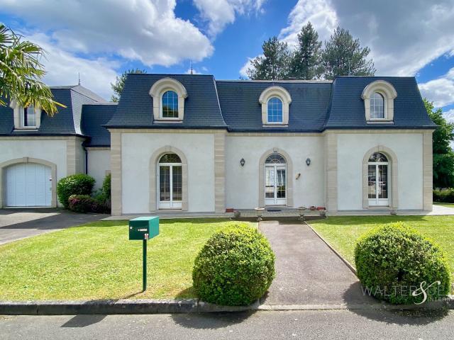 Maison 7 pièces 244 m²