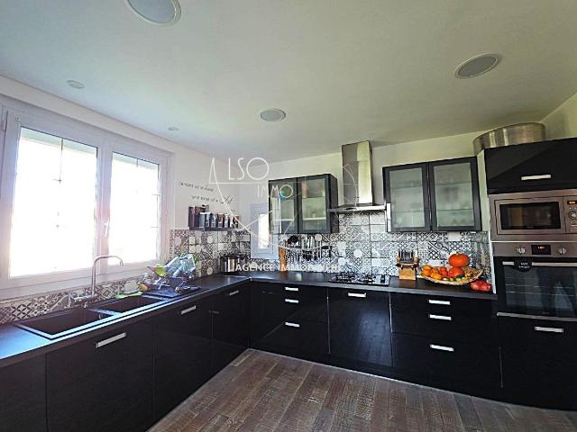 Maison 7 pièces 244 m²