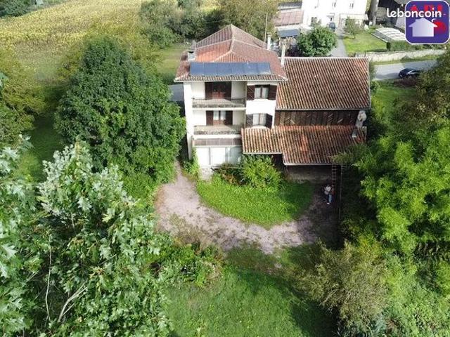 Maison 7 pièces 240 m²